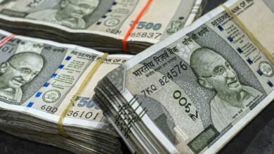 Police investigate abandoned bags filled with cash bundles and suspected fake currency papers found near Sanwer Ujjain road in Madhya Pradesh