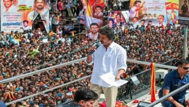 Chief Minister Vijay greeting supporters during his first public outreach event in Tamil Nadu.