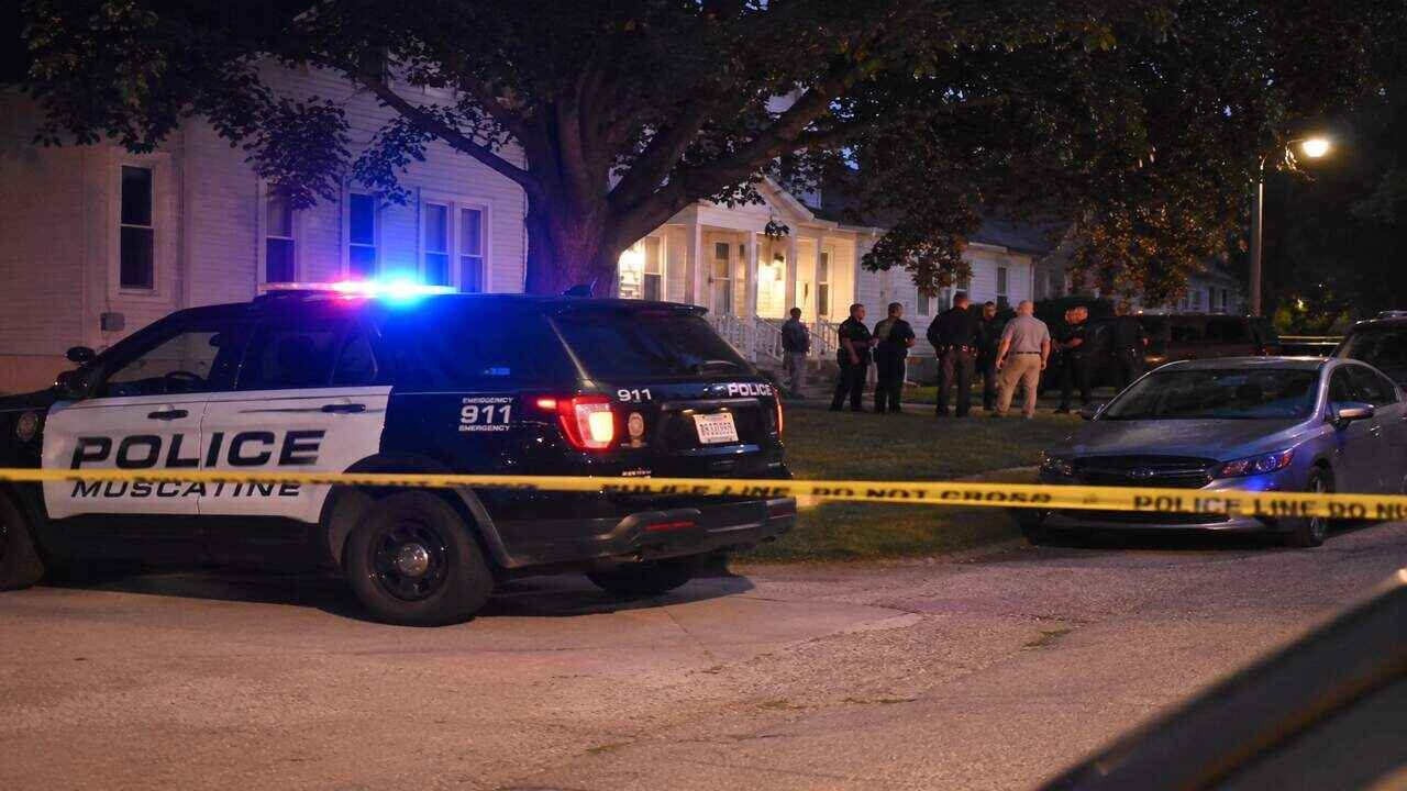 Law enforcement officers respond to a deadly family shooting incident in Iowa that left multiple people dead