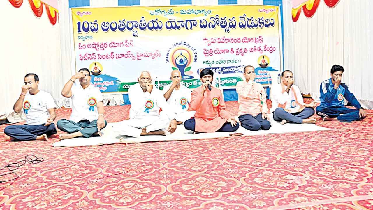 Telangana Yoga Day: People participating in International Yoga Day celebrations across Telangana