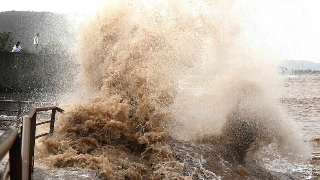 Typhoon Bavi Batters China as Floodwaters Swamp Cities and Trigger Mass Evacuations